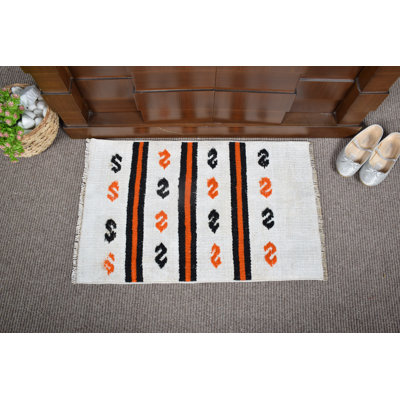 Tapis kilim turc tissé à la main avec des motifs géométriques pour un décor de style bohème