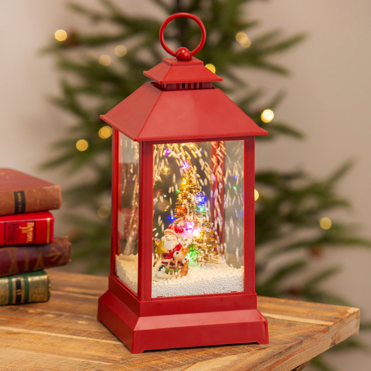 The Holiday Aisle® 12 LED Lantern With Rotating Christmas Scene, Faux  Snow, And Music