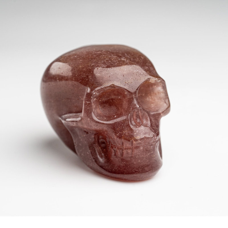 Polished Strawberry Quartz Skull Carving (125.4 Grams)
