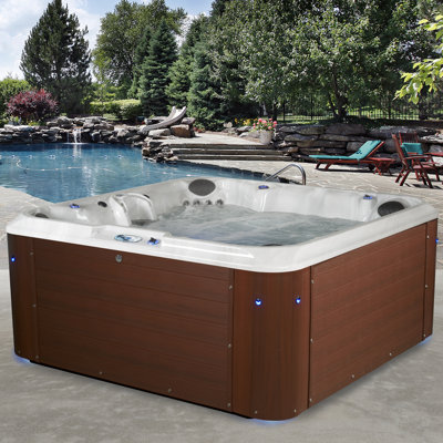  Amplified™ 7-Person 100-Jet Lounger Hot Tub Spa with Bluetooth Stereo, 3 Pumps, LED Lighting, Stainless Steel Heater and Ozonator, Insulated Cover Included and Steps Included
