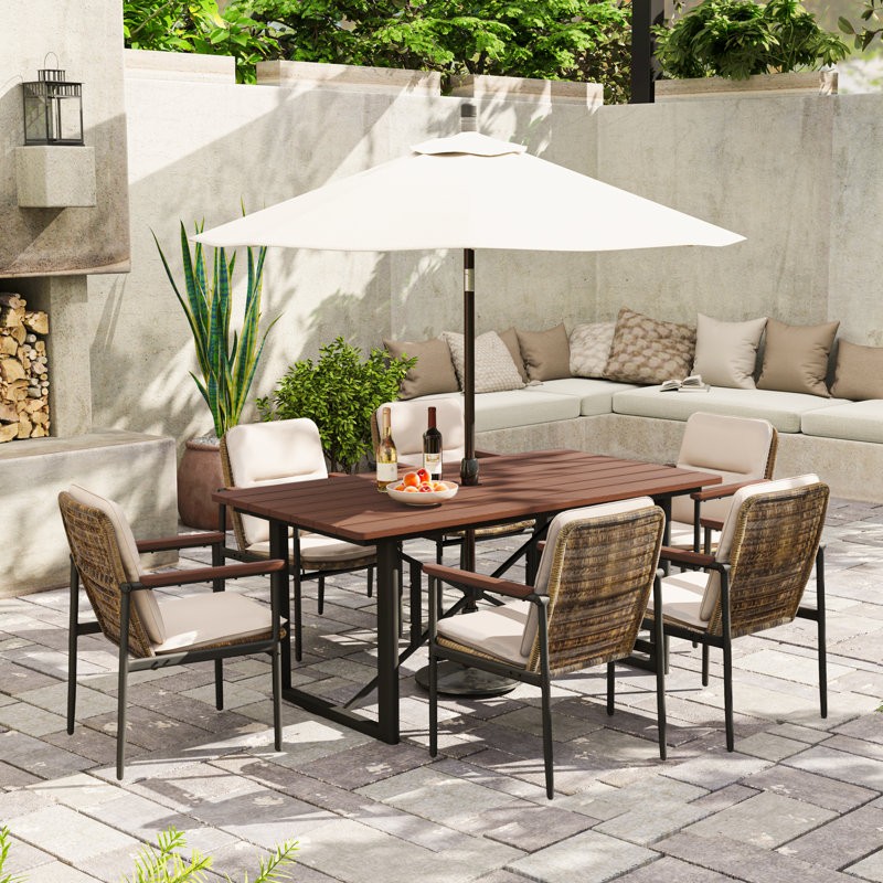 Huskins 7-Piece Aluminum Outdoor Dining Set With Wooden Table Top, Wicker Chairs And Light Gray Cushions