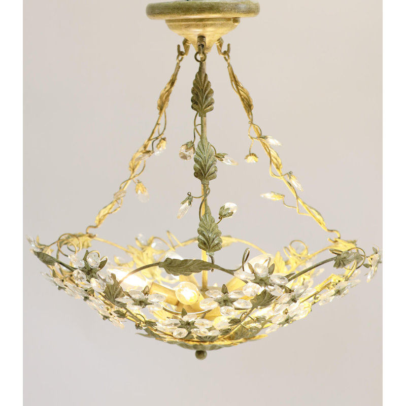 Lustre géométrique unique à 4 lumières avec détails en cristal Colyn