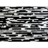 Cojonudo Cowhide Abstract Area Rug