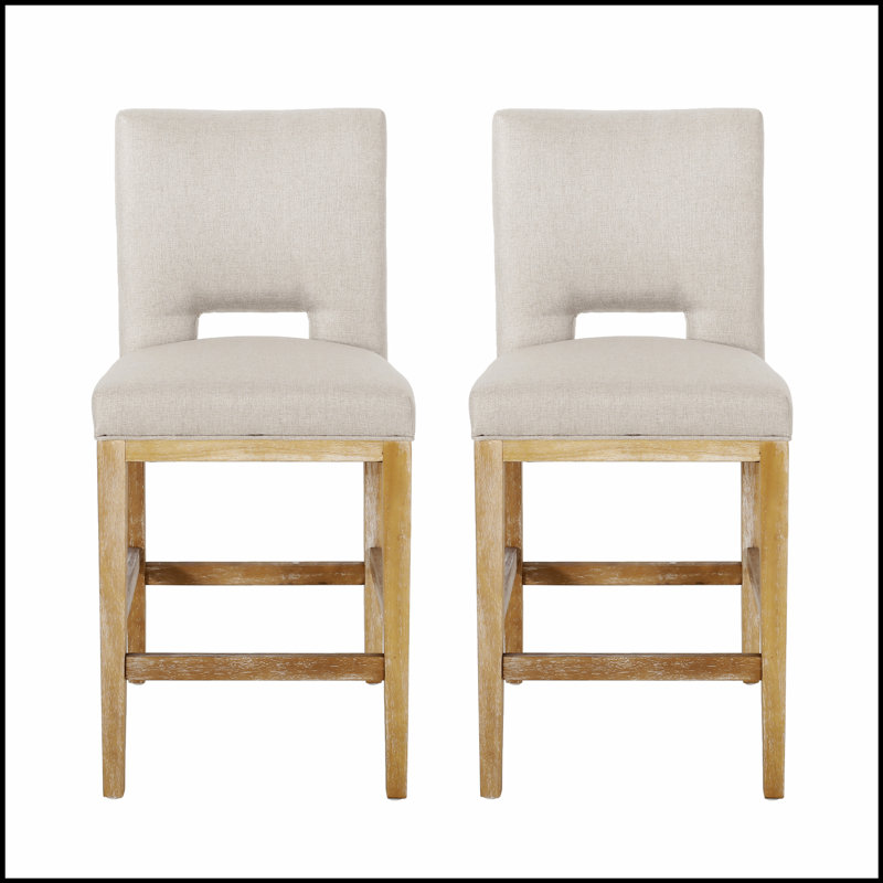 Tabouret de comptoir moderne et minimaliste avec siège rembourré confortable et pieds en bois robustes, parfait pour les cuisines et les salles à manger contemporaines.