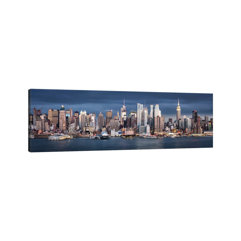 Panoramic View Of The Manhattan Skyline Along The Hudson River by Jan Becke - Wrapped Canvas Panoramic Print