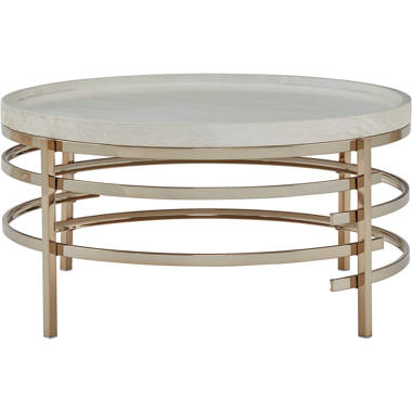 Montiflyn - Round Cocktail Table - Detroit Furniture Stores
