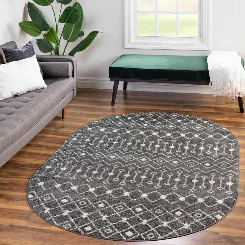 Tapis gris foncé en polypropylène tissé à la machine Briehn, Ovale 5 pi 3 po x 8 pi