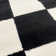 Tapis noir à motif géométrique Carpenter