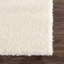 Tapis à poils longs Cleta-571779278