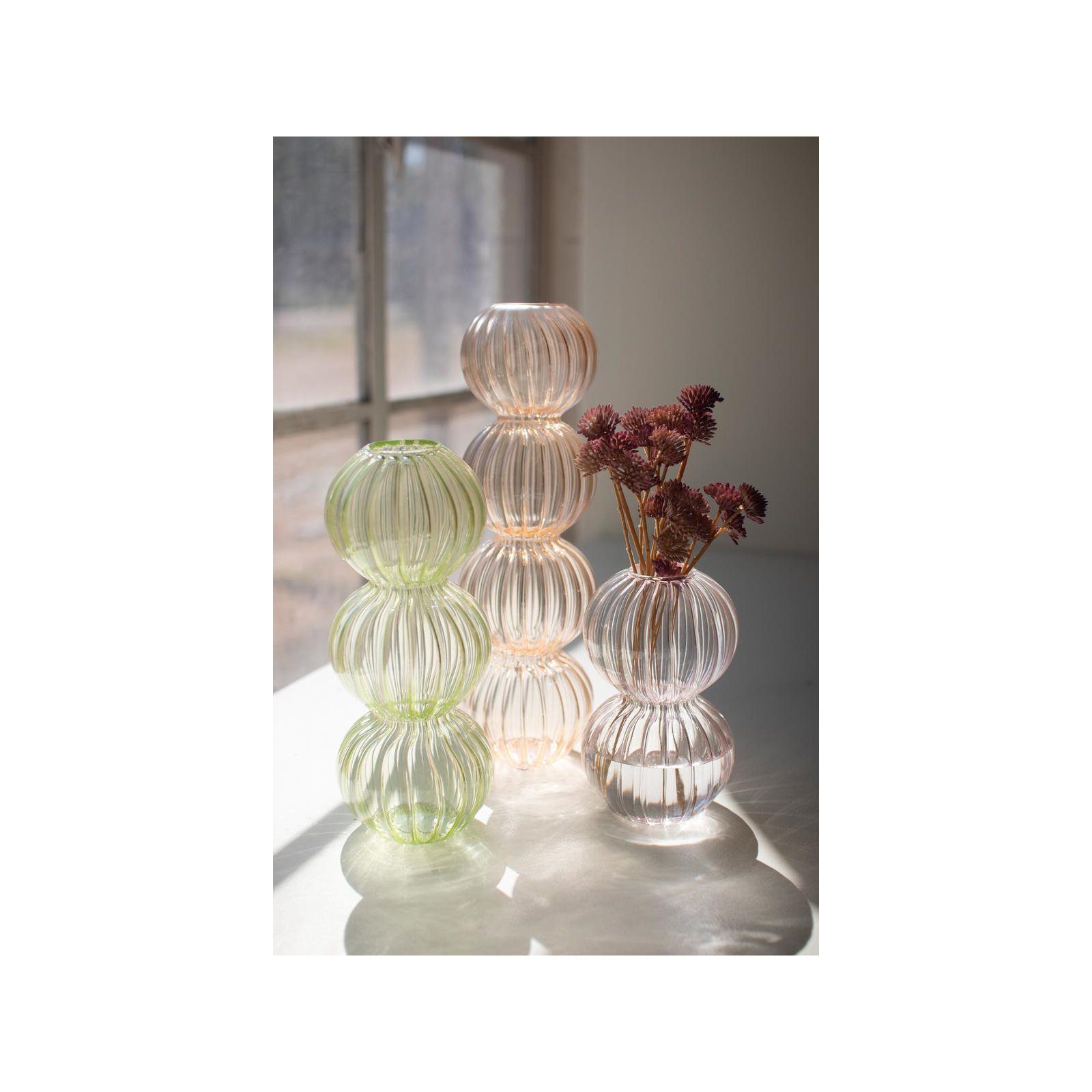 SET OF THREE FLUTED GLASS STACKING BALL VASES - ONE EACH COLOR