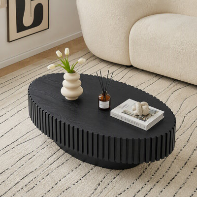 Table basse à tambour moderne de 43,7 pouces de style moderne fabriquée à la main pour le salon, petite table basse ovale avec piédestal robuste, panneau de fibres à densité moyenne noir
