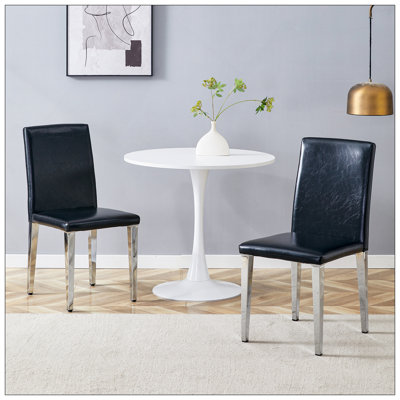 Quatre chaises de salle à manger en polyuréthane blanc, simples et polyvalentes, confortables et accompagnées. La chaise de salle à manger exquise et multifonctionnelle a ouvert une nouvelle expérience confortable. (Ensemble de 4 pièces)