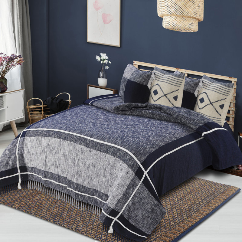 Jeté géométrique en coton tissé bleu