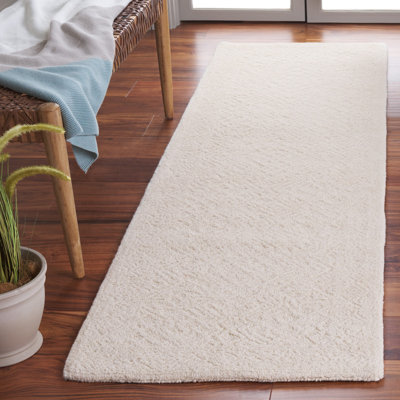 Tapis oriental texturé en coton et laine touffeté à la main ivoire