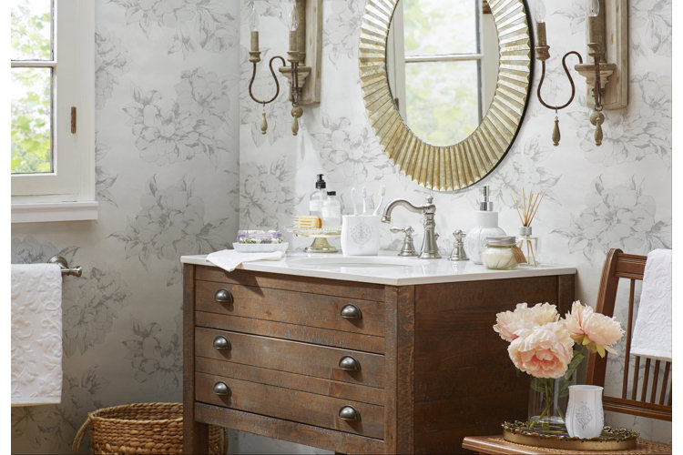 farmhouse-style powder room with gray and white floral wallpaper and a rustic wood vanity