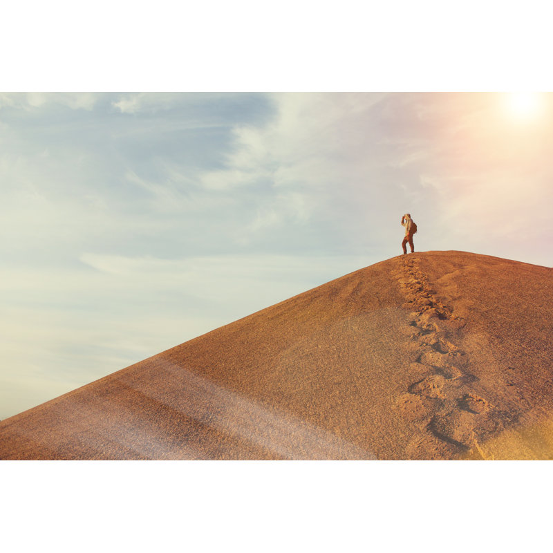 Man On Top Of A Dune In The Desert - Wrapped Canvas Print, 30cm H x 46cm W x 3.8cm D