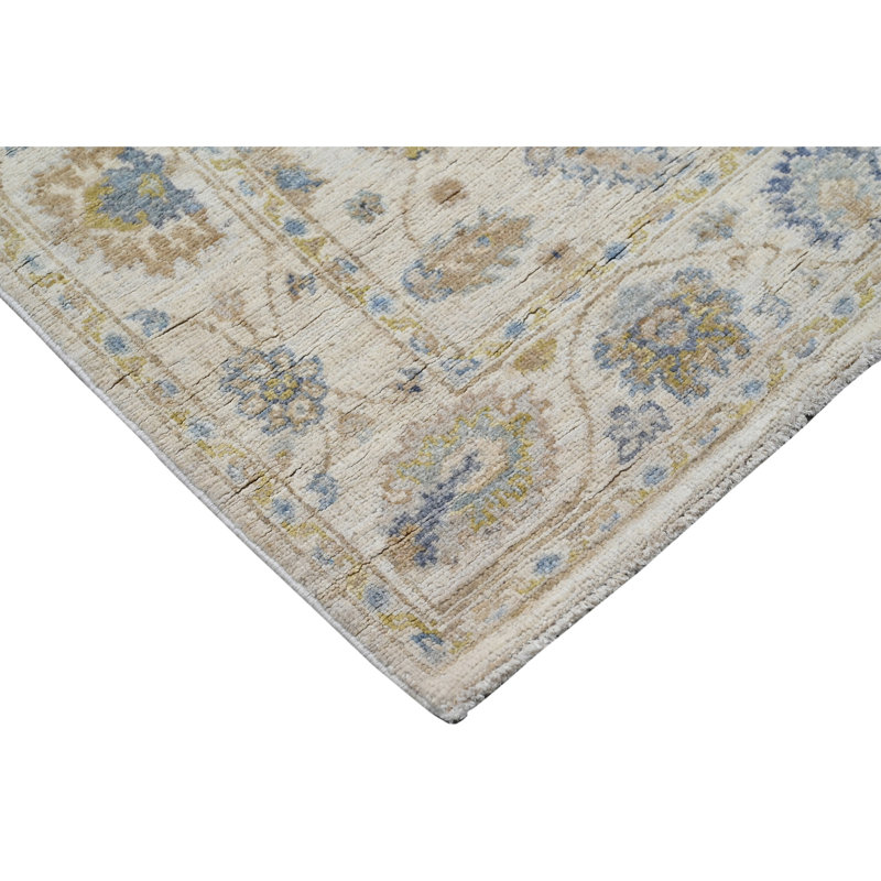 Tapis ivoire noué à la main de haute qualité