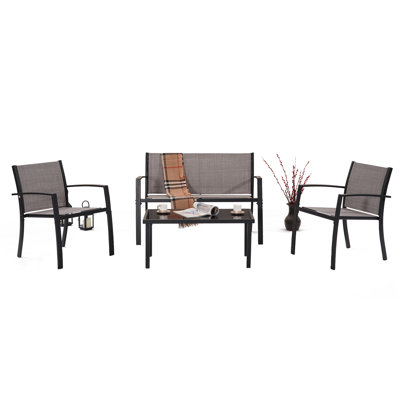 Clearbrook 4 - Person Patio Dining Set Rectangular Table with Cushions Included