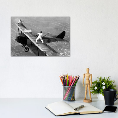 Playing Tennis On A Biplane In 1925 by Unknown Artist - Wrapped Canvas Print