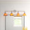 Barre d'éclairage de salle de bain 4 lumières Eilif Vintage avec verre Firré Saturn 7 "