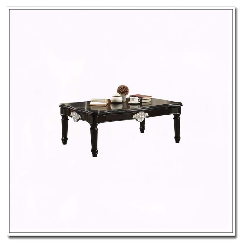 Table basse noire avec pieds tournés