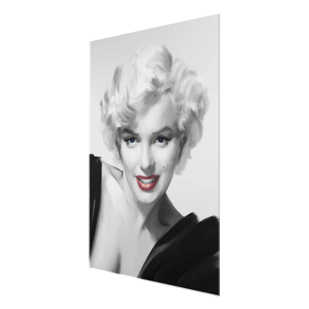 Glasbild Marilyn auf einem Sofa