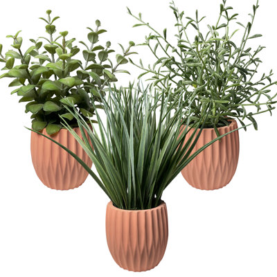 Plantes artificielles en pot