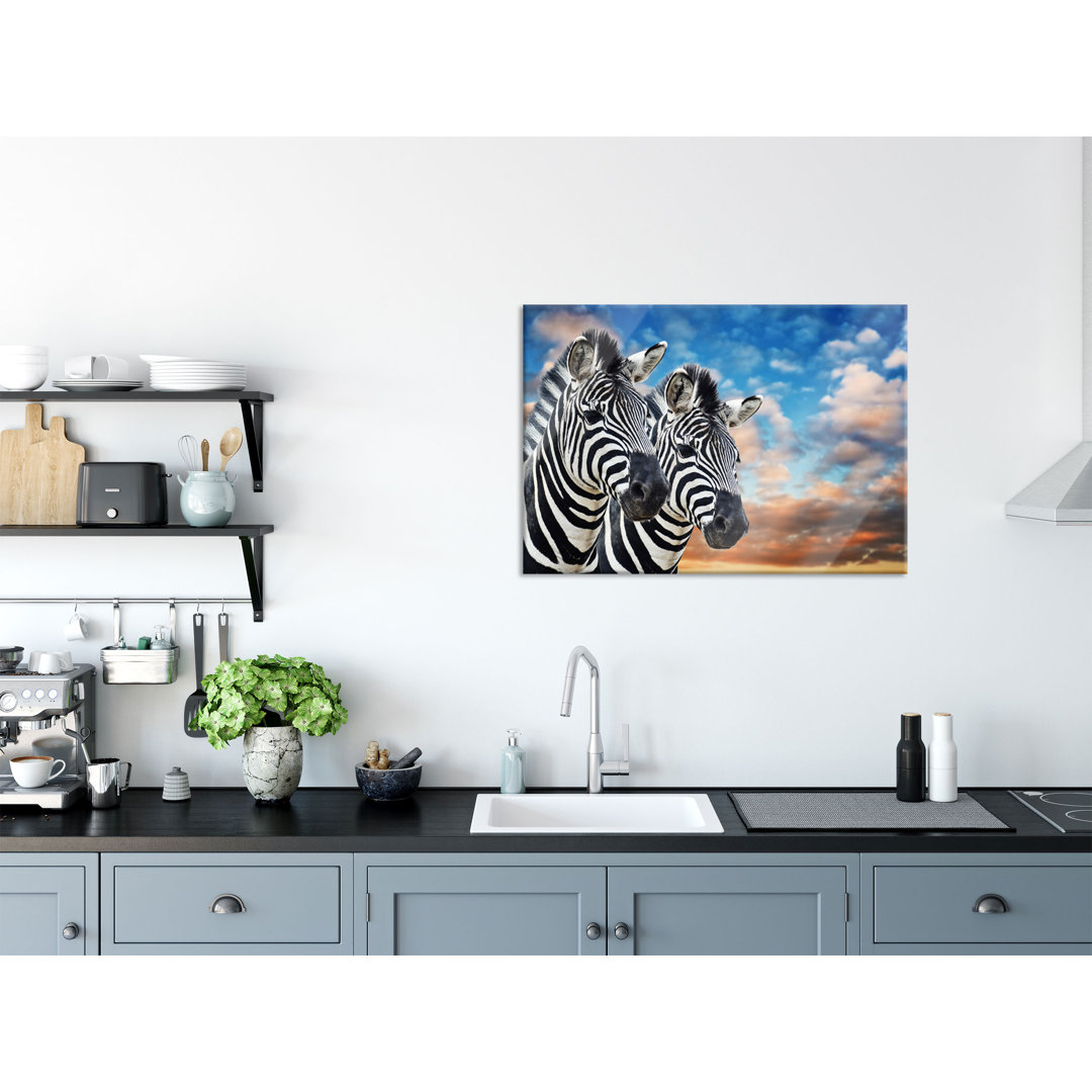 Glasbild Zebra-Paar