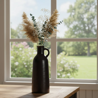 Minimalist Black Ceramic Vase, Slender Teapot Design, A Sophisticated Floral Arrangement For The Living Room Or Entryway.