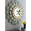 Miroir médaillon en fer forgé rehaussé d'élégance florale