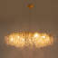 Grand lustre luxueux unique en cristal de type linéaire à 12 lumières