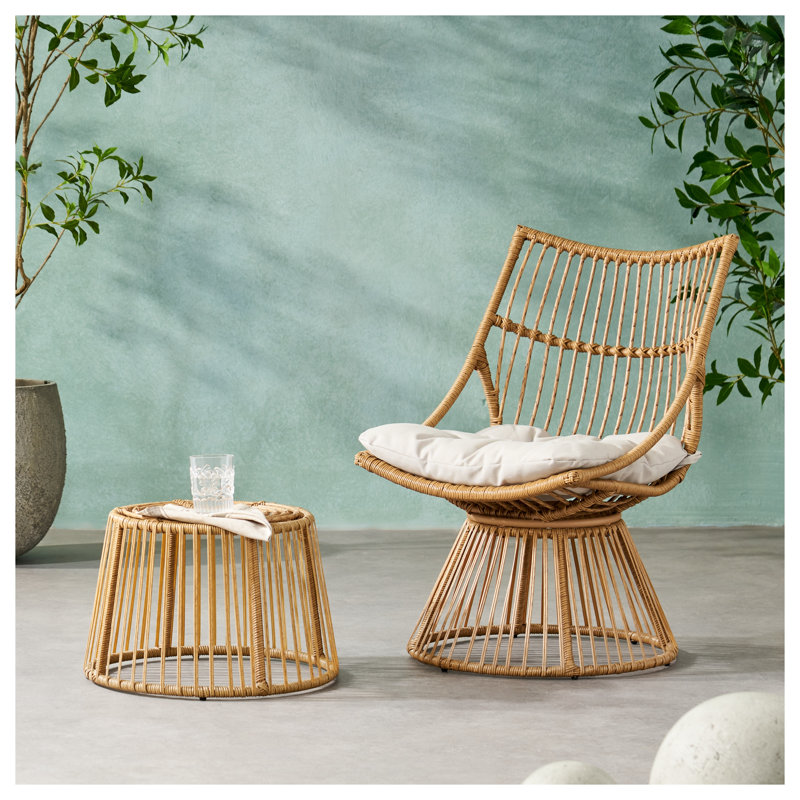 Charmant fauteuil en faux rotin et table d'appoint pour la détente
