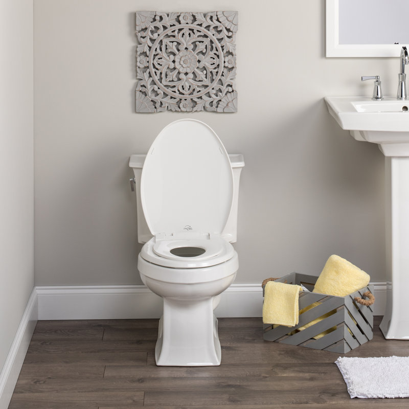 White Plastic Round Toilet Seat with Built-In Potty Training
