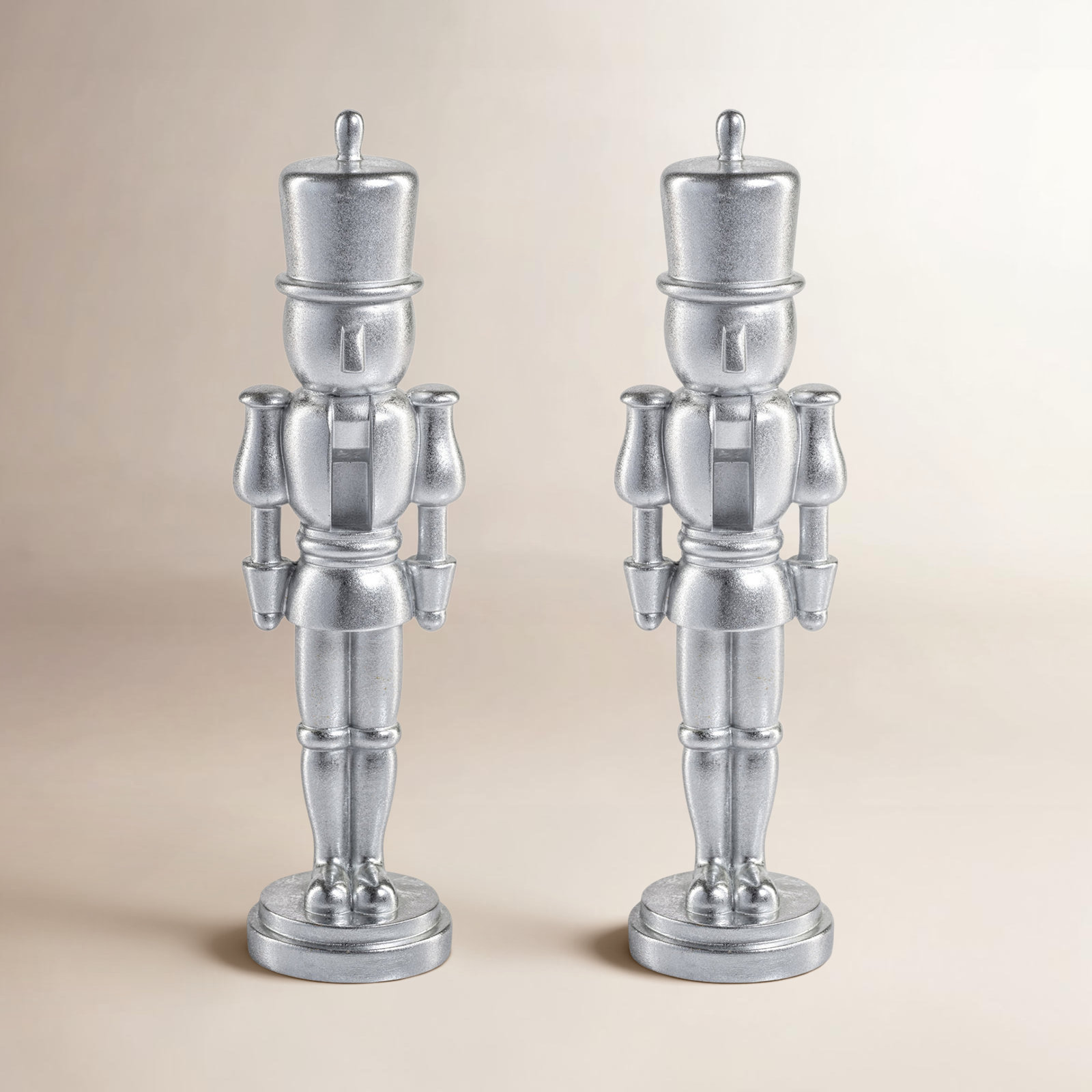 Hartwin 2-Piece Set Metallic Decorative Nutcracker Figurines, 10" H x 2.5" W x 2.5" D, Silver