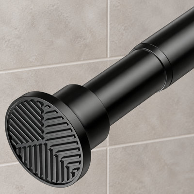 Cette barre de tension de douche noire robuste s'ajuste de 28 à 75 pouces et a un diamètre de 1 po; la conception antidérapante et sans perceuse est conçue pour les salles de bain, les fenêtres, les placards et les garde-robes.