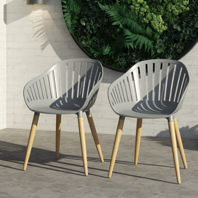 Fauteuil de patio empilable en eucalyptus Frey