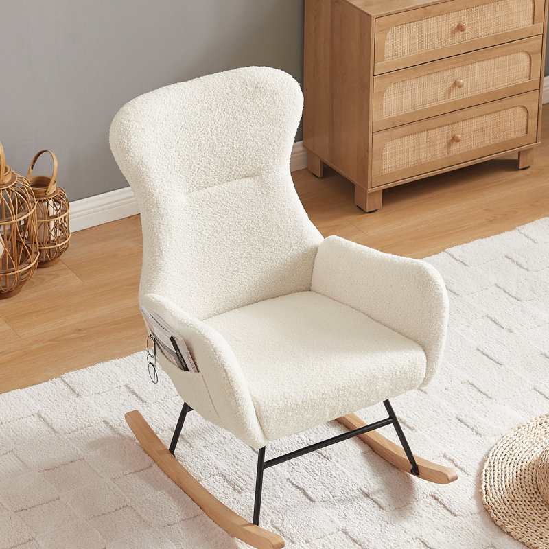 Chaise berçante en tissu blanc crème avec structure en métal