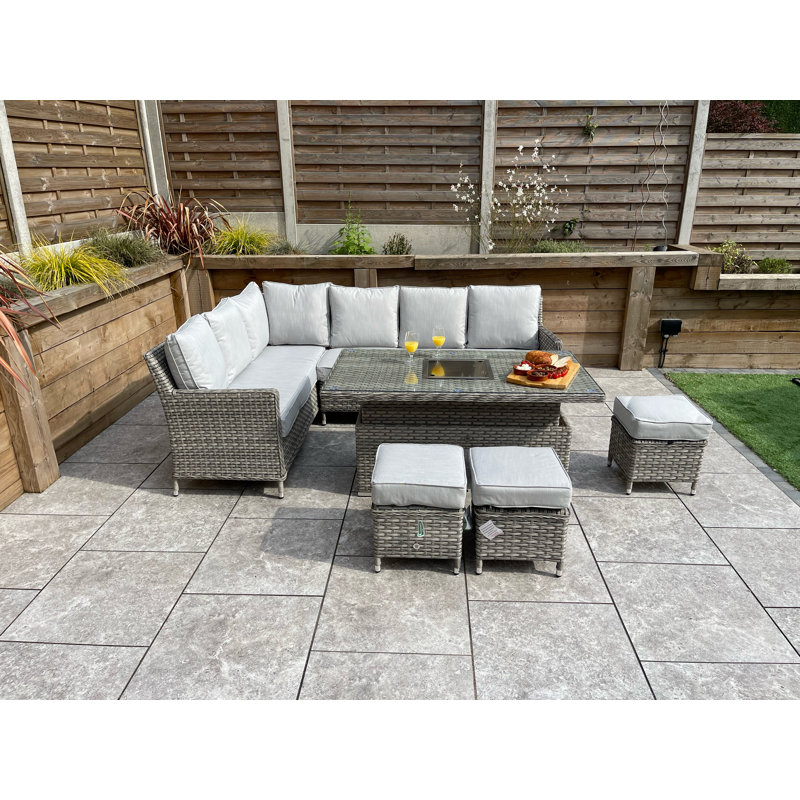 Rochele 9 - Person Wicker Patio Dining Set with Rectangular Table , Cushions Included