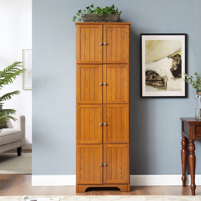 Armoire en chêne de 72,4 po de hauteur avec 8 portes et 4 tablettes. Pour différents endroits. Extérieur lisse, construction robuste, divers emplacements. Finition, construction