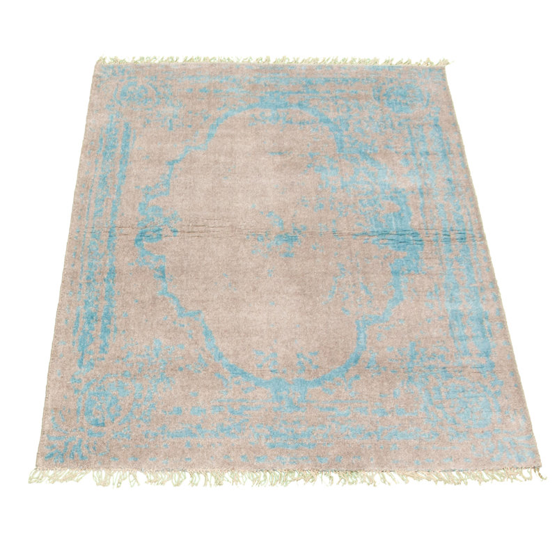 Tapis beige noué à la main