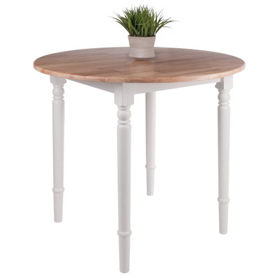 Donaven Extendable Beech Round Solid Wood Dining Table