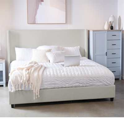 Ana King Upholstered Wingback Bed