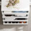 Commode 14 tiroirs à 1 tablette avec design gracieux et plateau en verre trempé