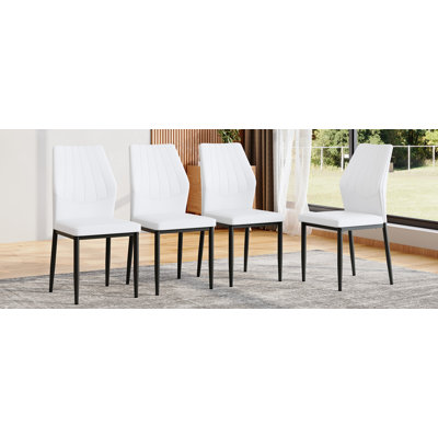 Ensemble de 4 chaises de salle à manger noires et blanches de 37 pouces de hauteur: dossier ergonomique en polyuréthane, combinant confort et style. Mélange parfaitement confort et élégance, ajoutant plus de confort et de style à l'heure du repas.