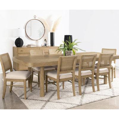 Table de salle à manger 9 de style bord de mer, table rectangulaire avec base à tréteaux, dossiers en canne tissés à la main et chaises rembourrées confortables, table extensible couleur sable, coussins en tissu crème