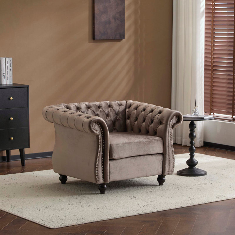 Fauteuil club Chesterfield - capitonné et clouté