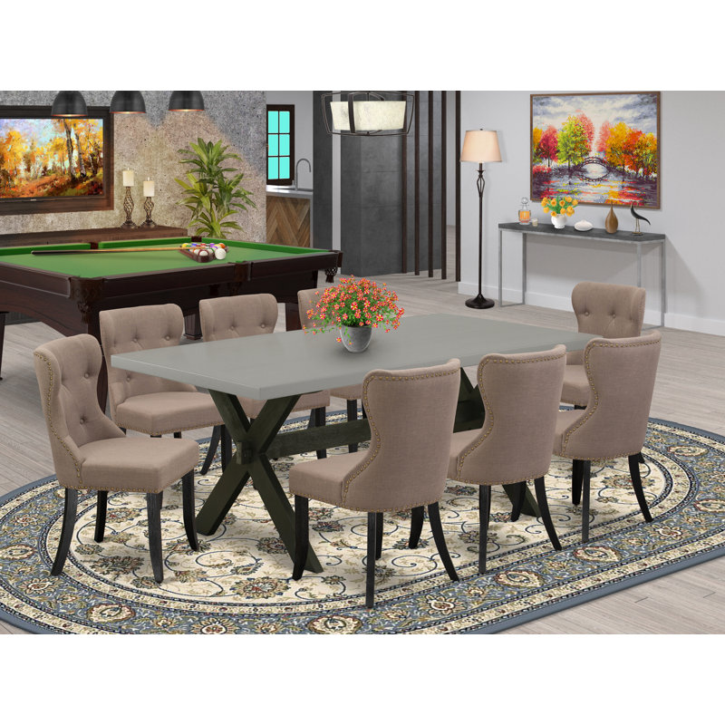 L'ensemble 9 pièces de table et chaises de cuisine comprend une table de salle à manger rectangulaire avec pieds en X et 8 chaises de salle à manger Parson en tissu de lin, finition noire brossée
