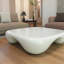 Table basse moderne en faux travertin texturé pour le salon / bureau-901062324
