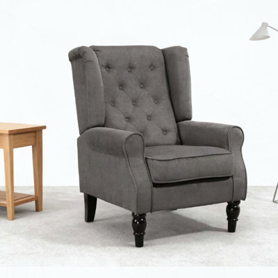 Fauteuil d'appoint capitonné gris foncé avec accoudoirs ronds
