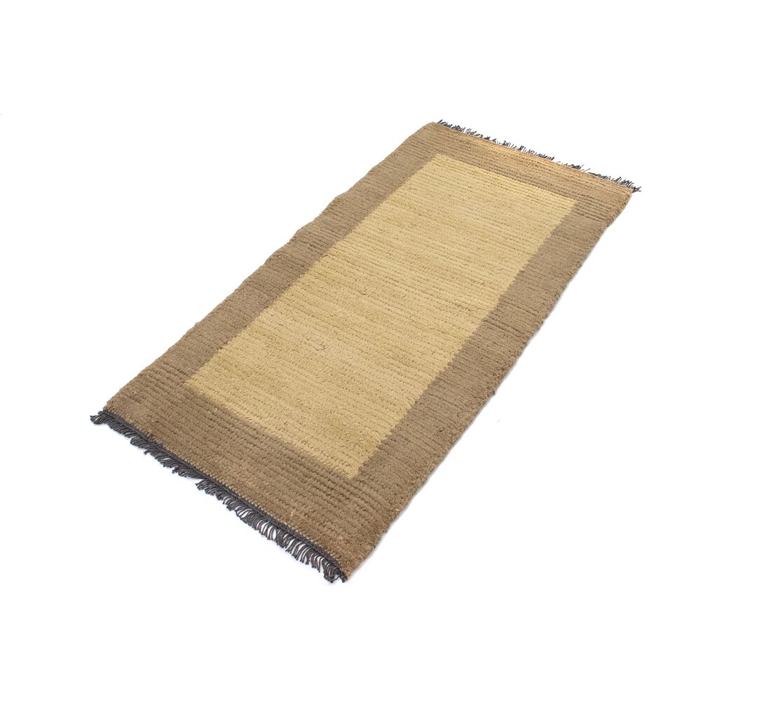 Handgefertigter Teppich Tisias aus Wolle in Beige